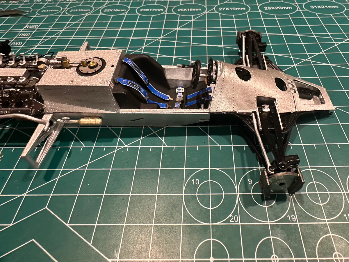Cockpit, harness and the riveted nose section.